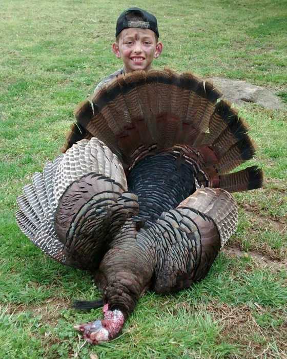 Dakota, age 10, with his very first turkey.