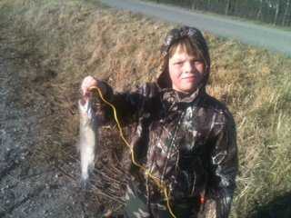 David Moore, Jr. from Sandyville, WV, with his rainbow trout caught at Rollins Lake